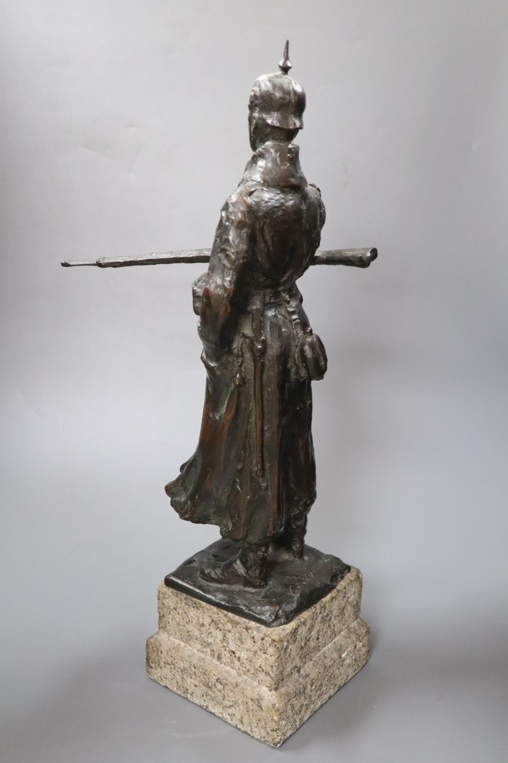 A bronze of Herrn Oberst von Suckow, signed, with related papers, height 51cm overall